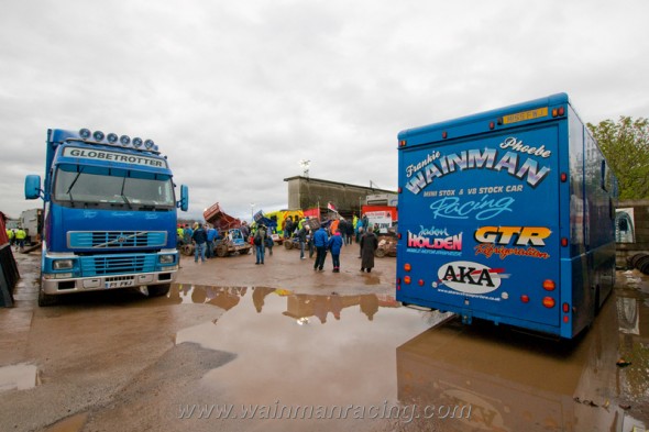 Both trucks in the pits