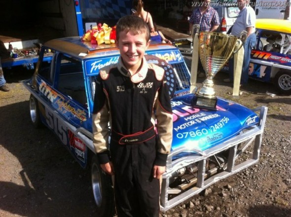 Frankie JJ with the National Championship trophy