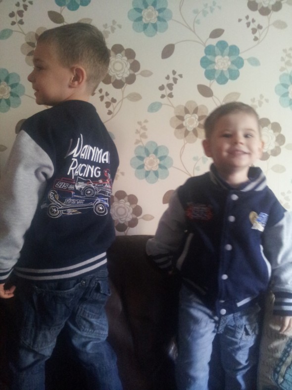 Jayden and Casey Tyler loving their new stock car coats.