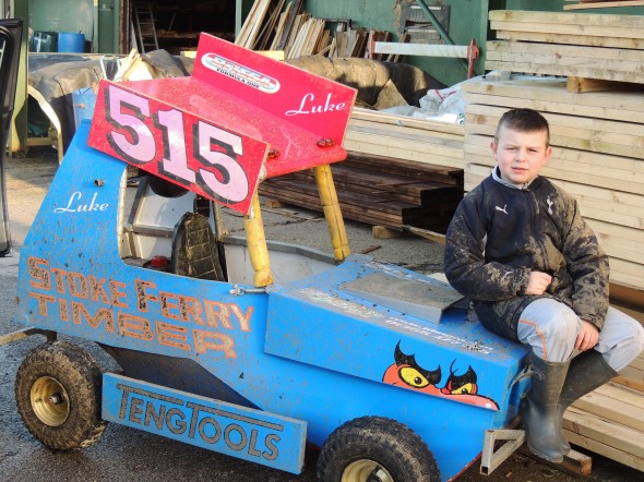 Luke with his mini 515 car.